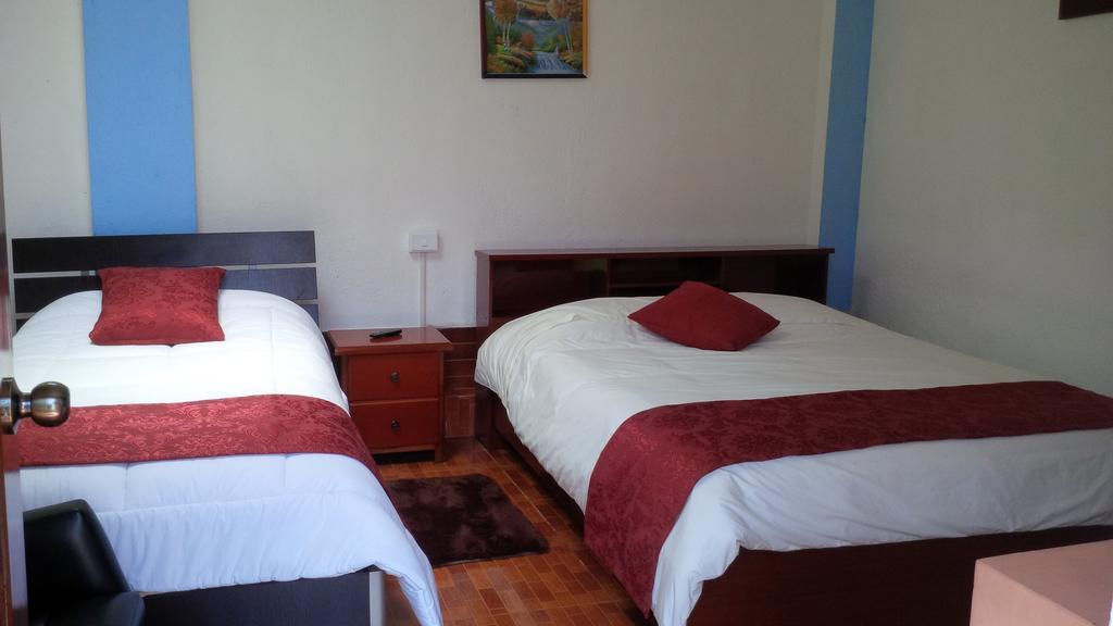 Hostal el Parque Tababela Habitación foto